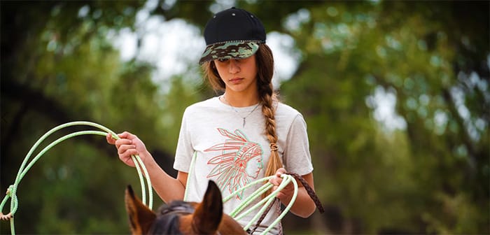 Girl Wearing Rhinestone Ball Cap